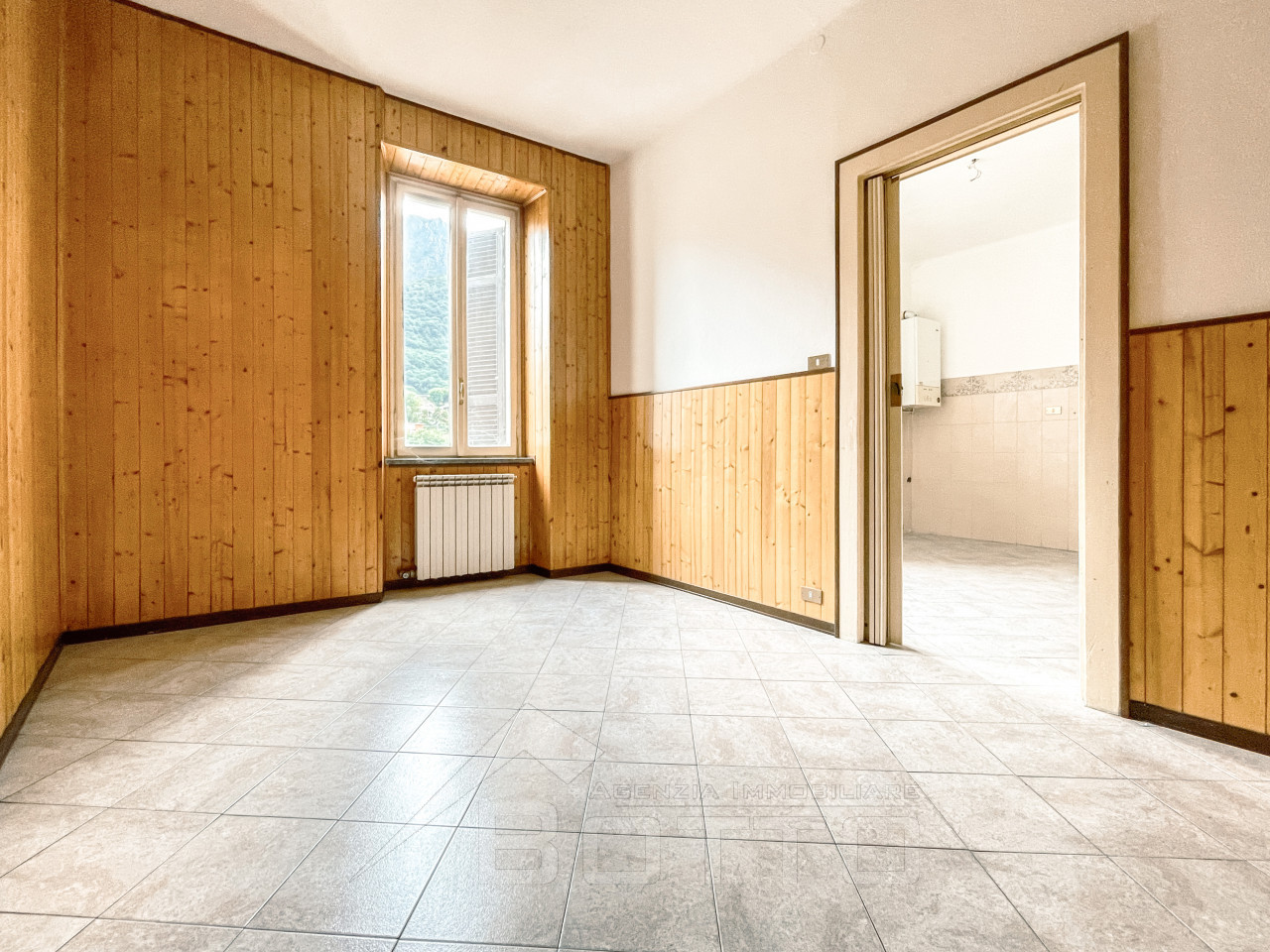 001__palazzina-vendita-crusinallo-stanza1_wmk_0