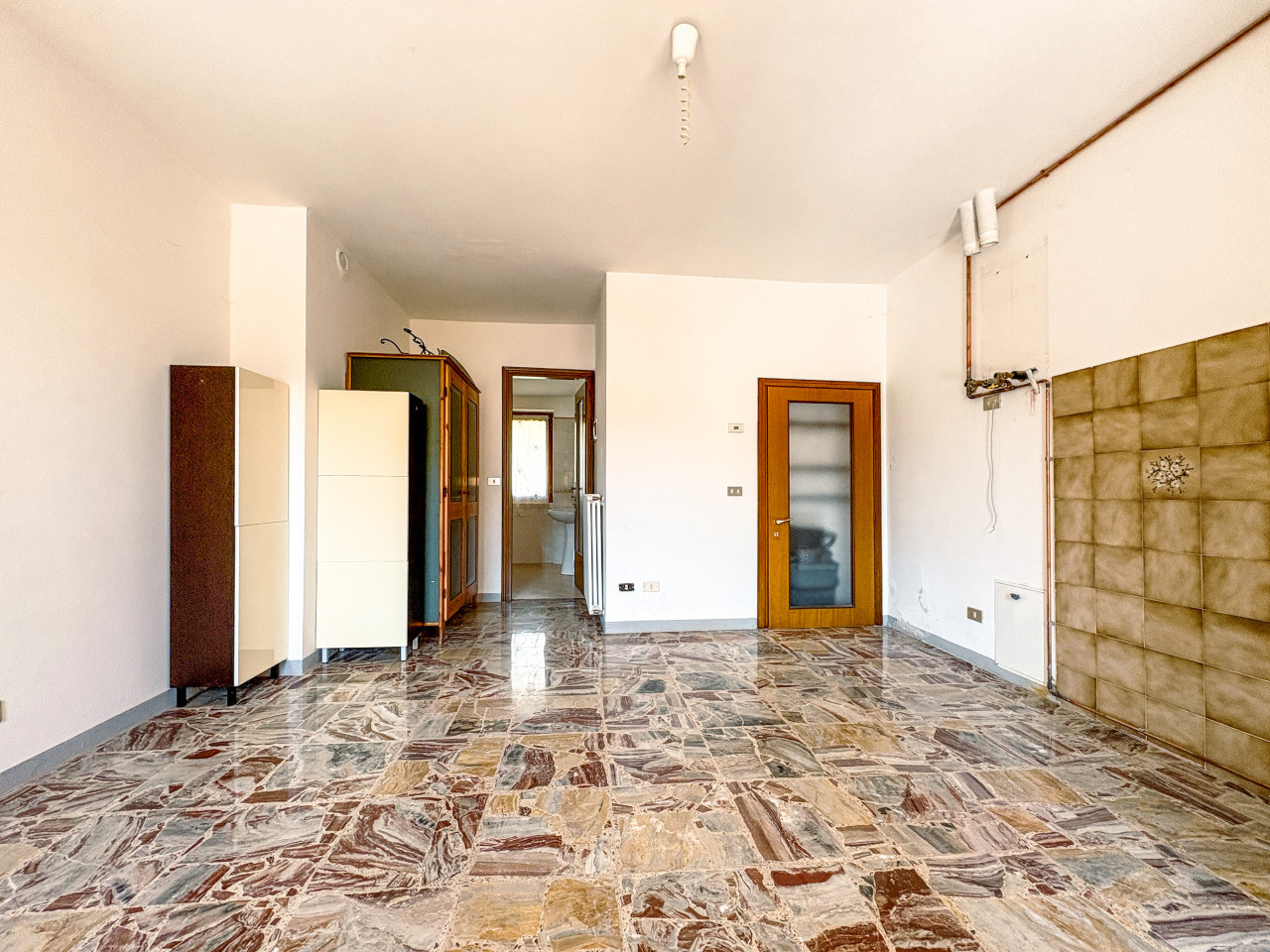 003__appartamento-vendita-brovello-stanza2_wmk_0