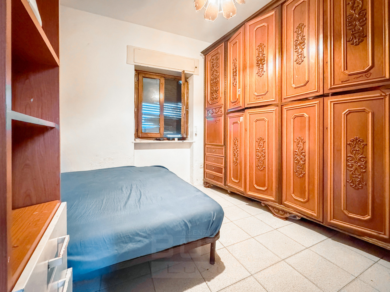 004__vendita-appartamento-borgoticino-camera2_wmk_0
